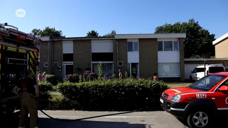 Grootvader en kleinzoon bevangen door rook nadat powerbank in wasmand vuur vat in Hamme